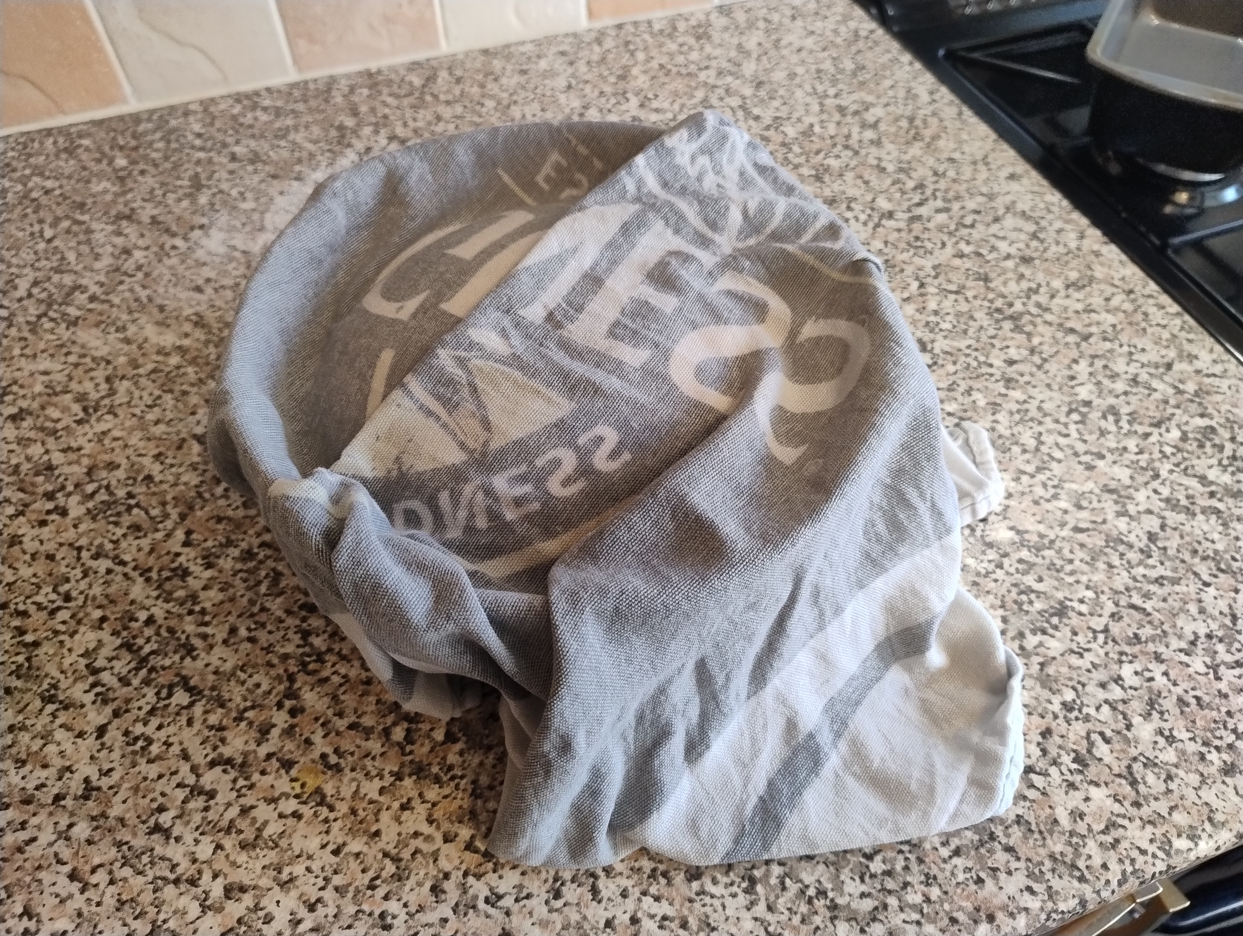 Towel Covering Proved Dough In Bowl